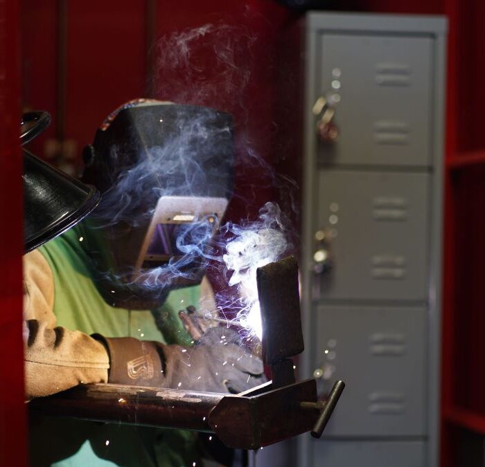 metal worker welding in the school